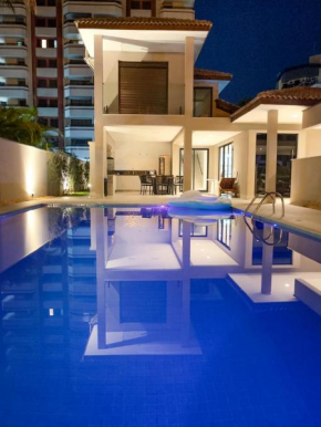 Em Riviera, módulo 3, localização 350m praia e Wifi